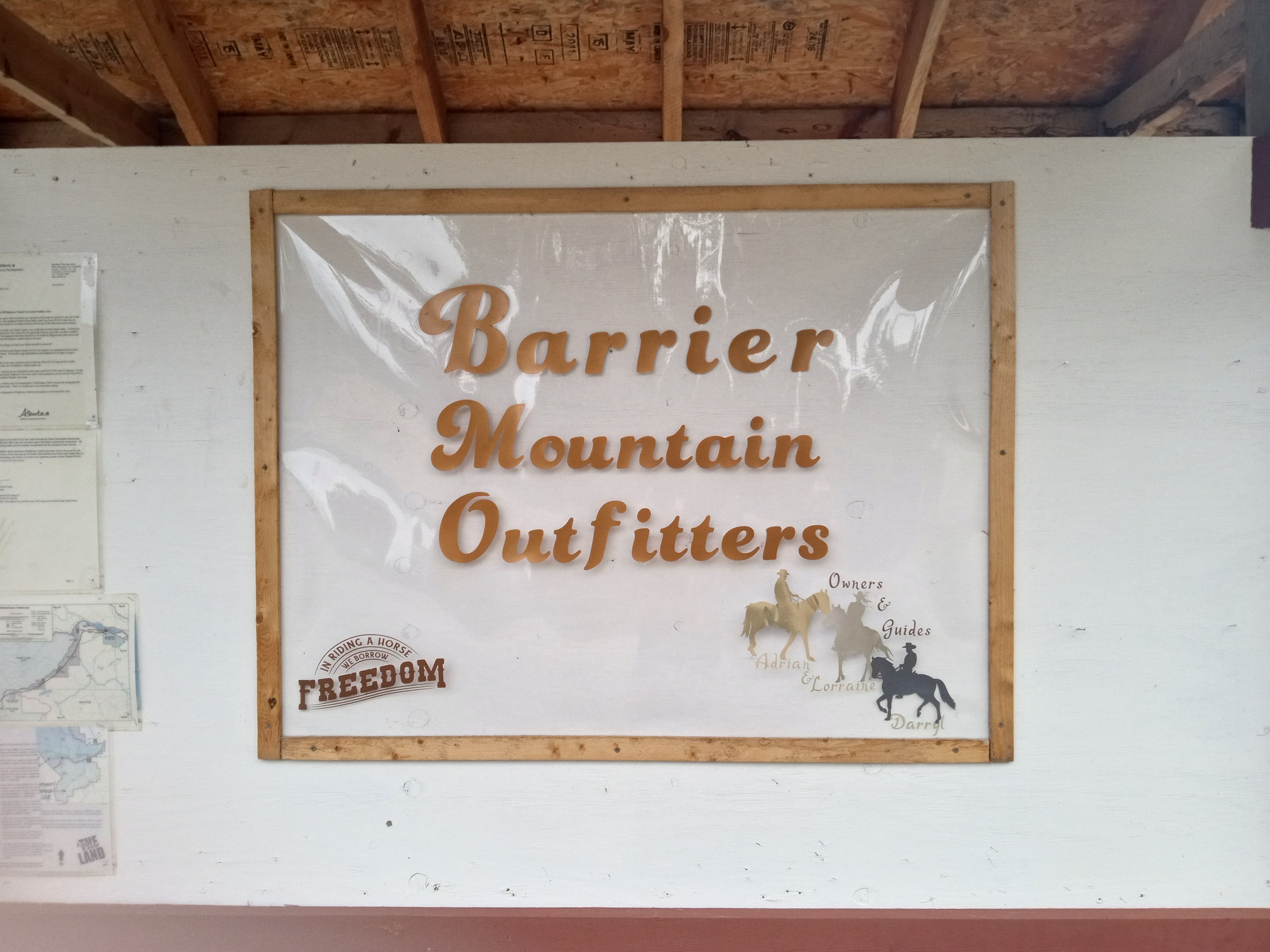 Barrier Mountain Outfitters sign — Owners & Guides Adrian, Lorraine & Darryl